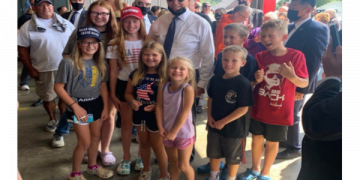 Joe Biden Was Trolled By Kids Wearing MAGA Gear During Photo Op