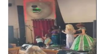 Drag Queen Dances While Little Girl Repeatedly Rubs Her Hand Up and Down the Crotch of “Little Mermaid” Costume