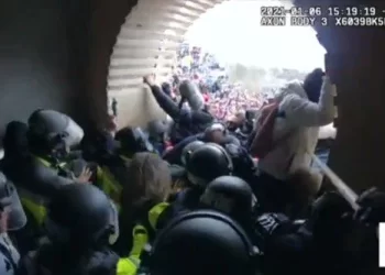 Bodycam Footage Shows DC Metro Officer Boasting About Beating Trump Supporters with a Flagpole on J6